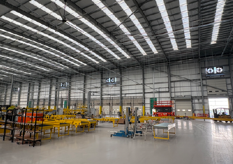 Warehousing facility with fans installed.